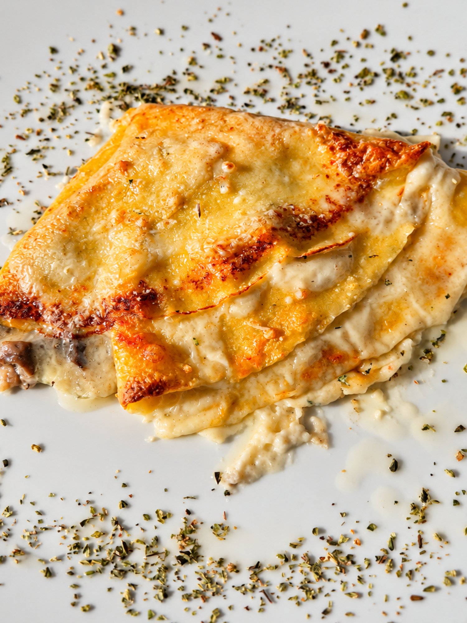 Crespelle funghi scamorza e besciamella